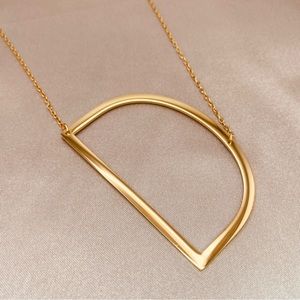Elegant Gold Geometric Necklace Letter D